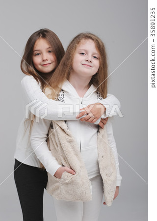 two beautiful girls on white background 35891235