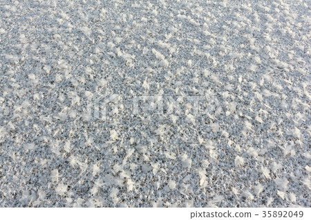 Rime on the ice of the freezing river 35892049