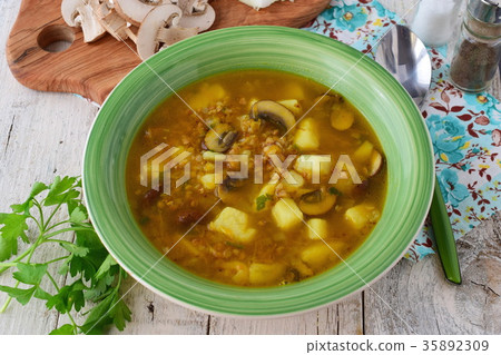 Healthy soup with buckwheat, potato, mushrooms Healthy soup with buckwheat, potato, mushrooms 35892309