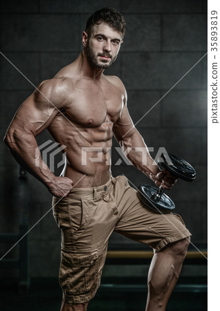 Attractive model young man training in gym Attractive model young man training in gym 35893819
