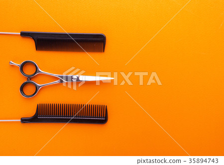 Hairdresser tools on color background Hairdresser tools on color background 35894743