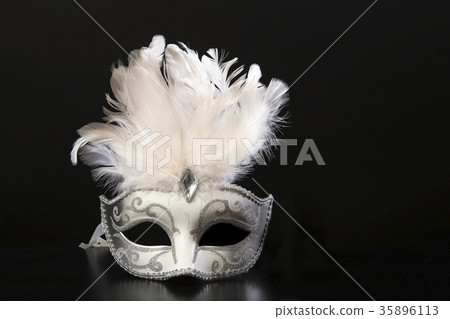 Pretty white and silver venetian carnival mask Pretty white and silver venetian carnival mask 35896113
