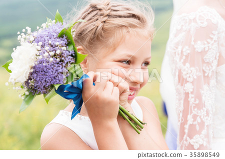 A cute little touching child and an amazing 35898549