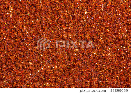 Saturated brick-colour background with glitter. 35899069