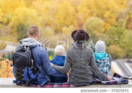 Parents and two sons look at the loess of height Parents and two sons look at the loess of height 35925641
