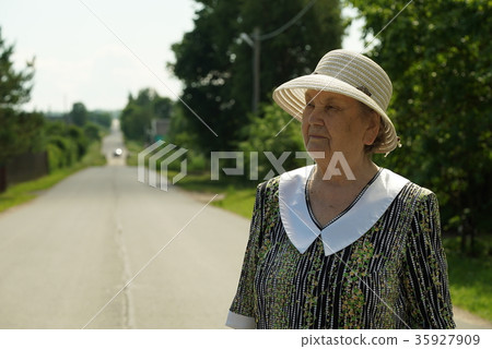 Portrait of elderly woman aged 80s dressed in hat 35927909
