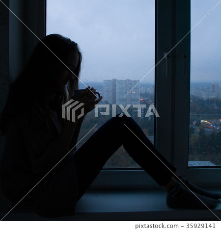 Silhouette of a young beautiful girl Silhouette of a young beautiful girl 35929141