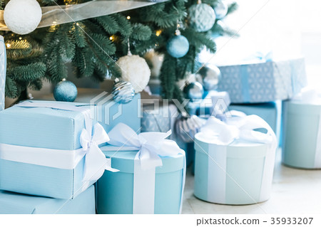Christmas living room with a Christmas tree, gifts Christmas living room with a Christmas tree, gifts 35933207