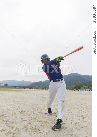 Good young man swinging in a beautiful batting form Good young man swinging in a beautiful batting form 35933594