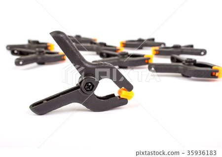 Clothespin. Carpentry clamps. Plastic clothespin 35936183