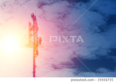 Technician working on communication tower 35938735