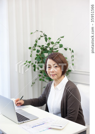 Tax return woman 35951566