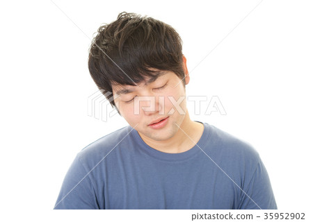 A man with a tired expression A man with a tired expression 35952902