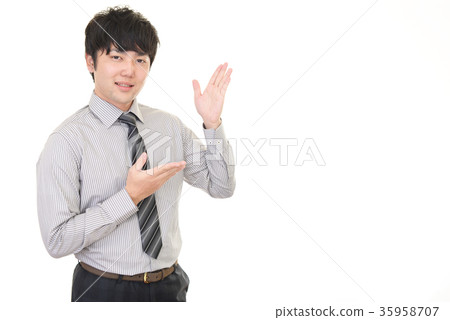 A smiling businessman to guide 35958707