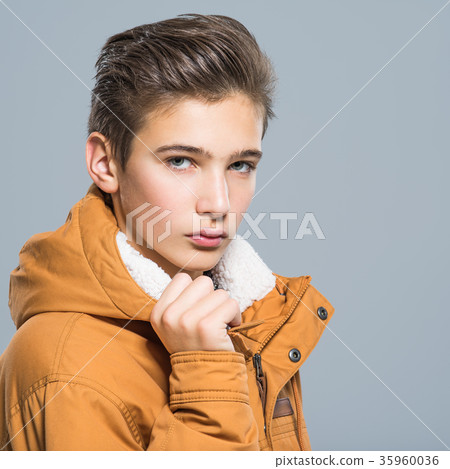 Teenage boy in winter clothes Teenage boy in winter clothes 35960036
