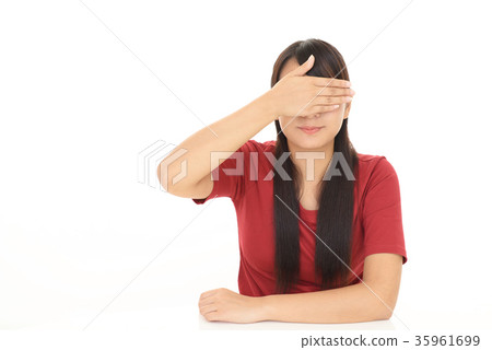 Serious Woman Adjusts Blindfold Over Her Eyes Stock Photo, Picture and  Royalty Free Image. Image 70769576.