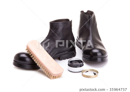 Cleaning and care of shoes on a white background. 35964737