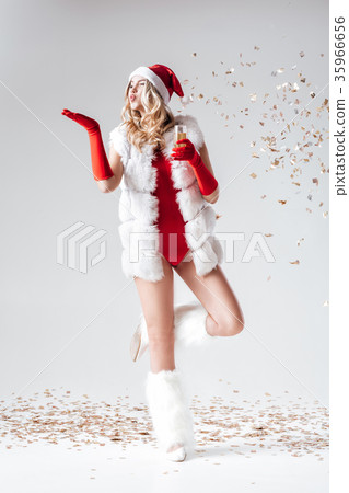 Santa girl in a white fur coat Santa girl in a white fur coat 35966656