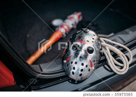 Hockey mask, baseball bat, rope, murderer concept 35973565