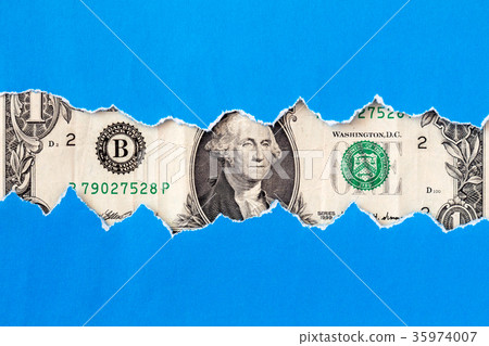 One dollar macro through torn paper One dollar macro through torn paper 35974007