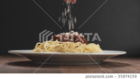 sprinkle grated aged parmesan cheese over sprinkle grated aged parmesan cheese over 35974159