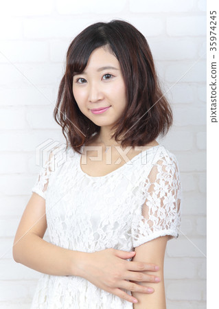 Young lady's hair style Young lady's hair style 35974245