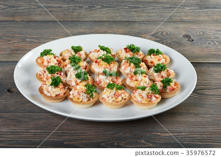 Delicious food on the wooden table Delicious food on the wooden table 35976572