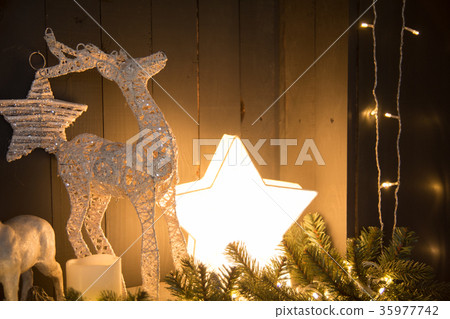Festive retro background with a burning star Festive retro background with a burning star 35977742