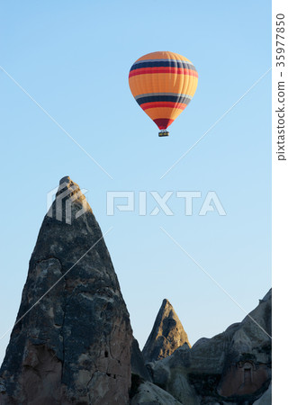 Balloon silhouette in the sunrise sky 35977850