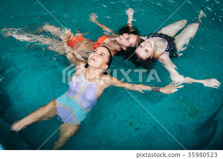 Funny female teenagers fooling around in the Funny female teenagers fooling around in the 35980523