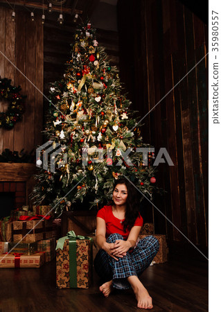 Woman with christmas present box on background Woman with christmas present box on background 35980557