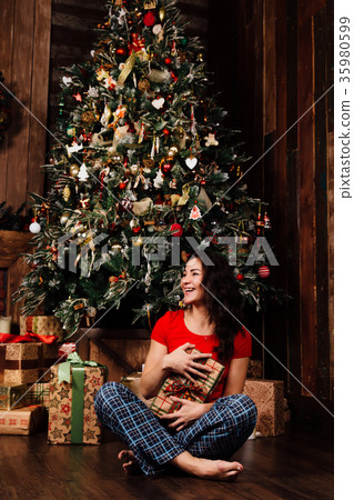 Woman with christmas present box on background 35980599