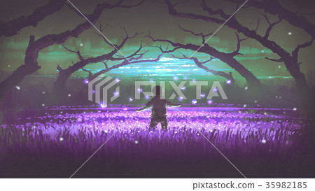 boy standing in the garden of purple flowers 35982185