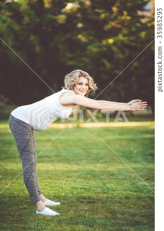 Beautiful slim sportive pregnant girl is doing 35985295