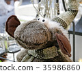 Funny Christmas reindeer in hat. 35986860