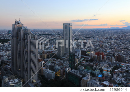 Shinjuku Park Tower and Tokyo Opera City at dusk 35986944