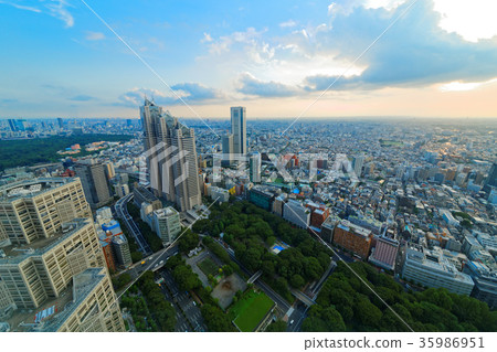 Shinjuku Park Tower and Tokyo Opera City at dusk 35986951