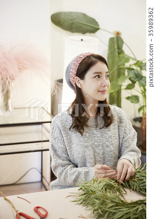 Young woman, florist, working Young woman, florist, working 35989362