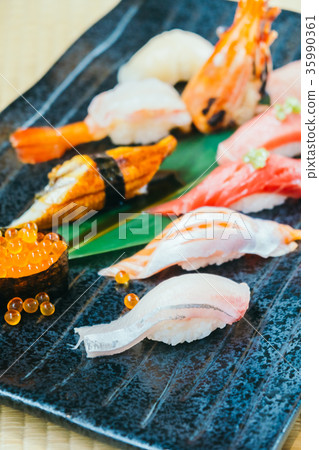 Raw and fresh salmon tuna shrimp and other sushi Raw and fresh salmon tuna shrimp and other sushi 35990361