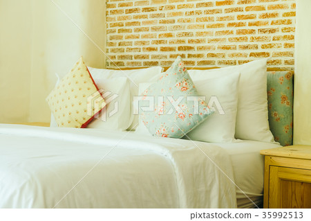 Pillow on bed decoration in bedroom interior Pillow on bed decoration in bedroom interior 35992513