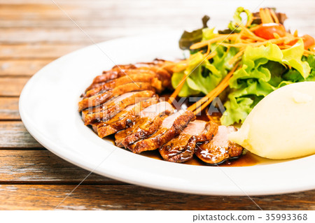 Grilled duck meat breast with vegetable Grilled duck meat breast with vegetable 35993368