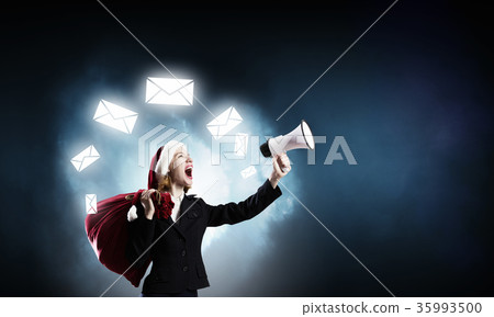Female Santa with megaphone 35993500