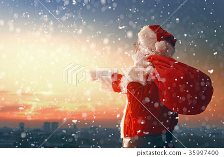 Santa Claus looking at city 35997400