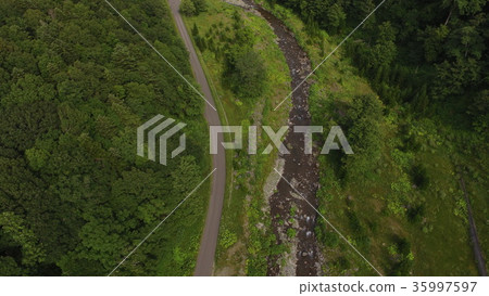 "River stream and road" taken from the sky with drone (near Iwaobetsu Onsen / Shari-cho, Shari-gun, Hokkaido) 35997597