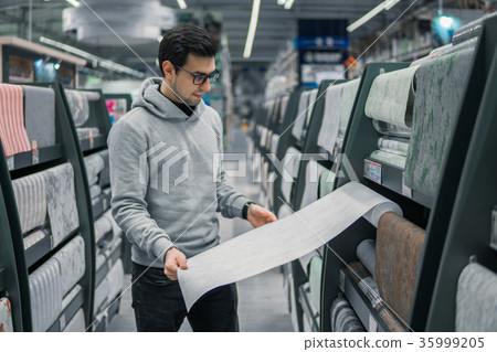 customer buying wallpaper in the car supermarket customer buying wallpaper in the car supermarket 35999205