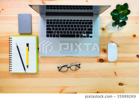 computer laptop and workspace layout on table  35999269