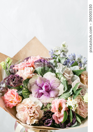 beautiful bouquet of mixed flowers into a vase on beautiful bouquet of mixed flowers into a vase on 36000380