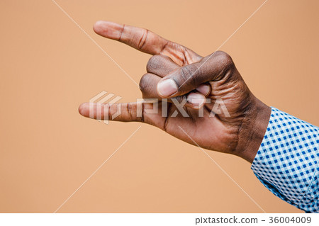 Male, man, hipster, in shirt, hand raised showing Male, man, hipster, in shirt, hand raised showing 36004009