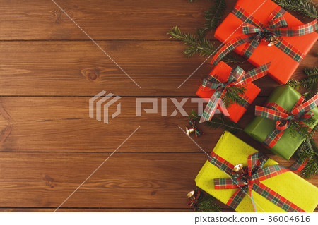 Colorful Christmas present boxes for on wooden 36004616