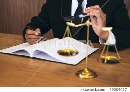 Judge gavel with Justice lawyers, Businessman in suit or lawyer Judge gavel with Justice lawyers, Businessman in suit or lawyer 36004617